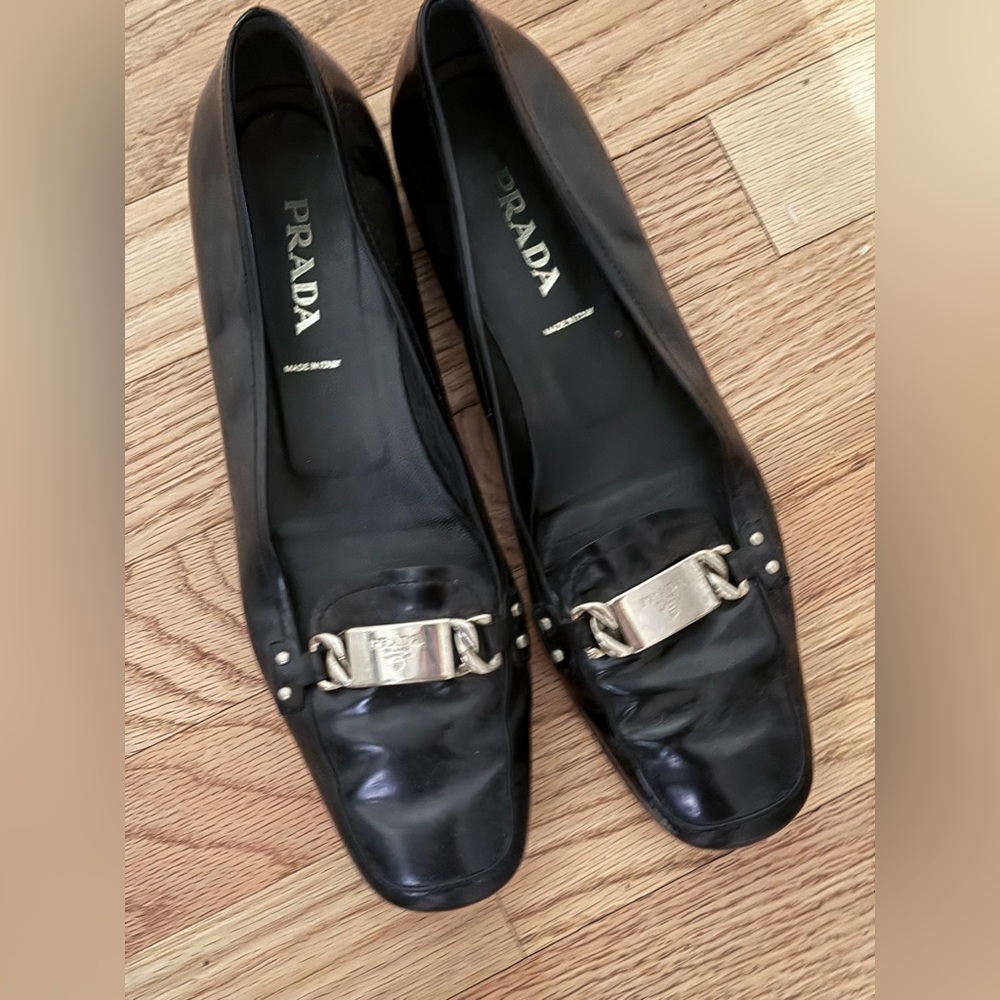 Prada Women's Black Flats with Silver Buckles